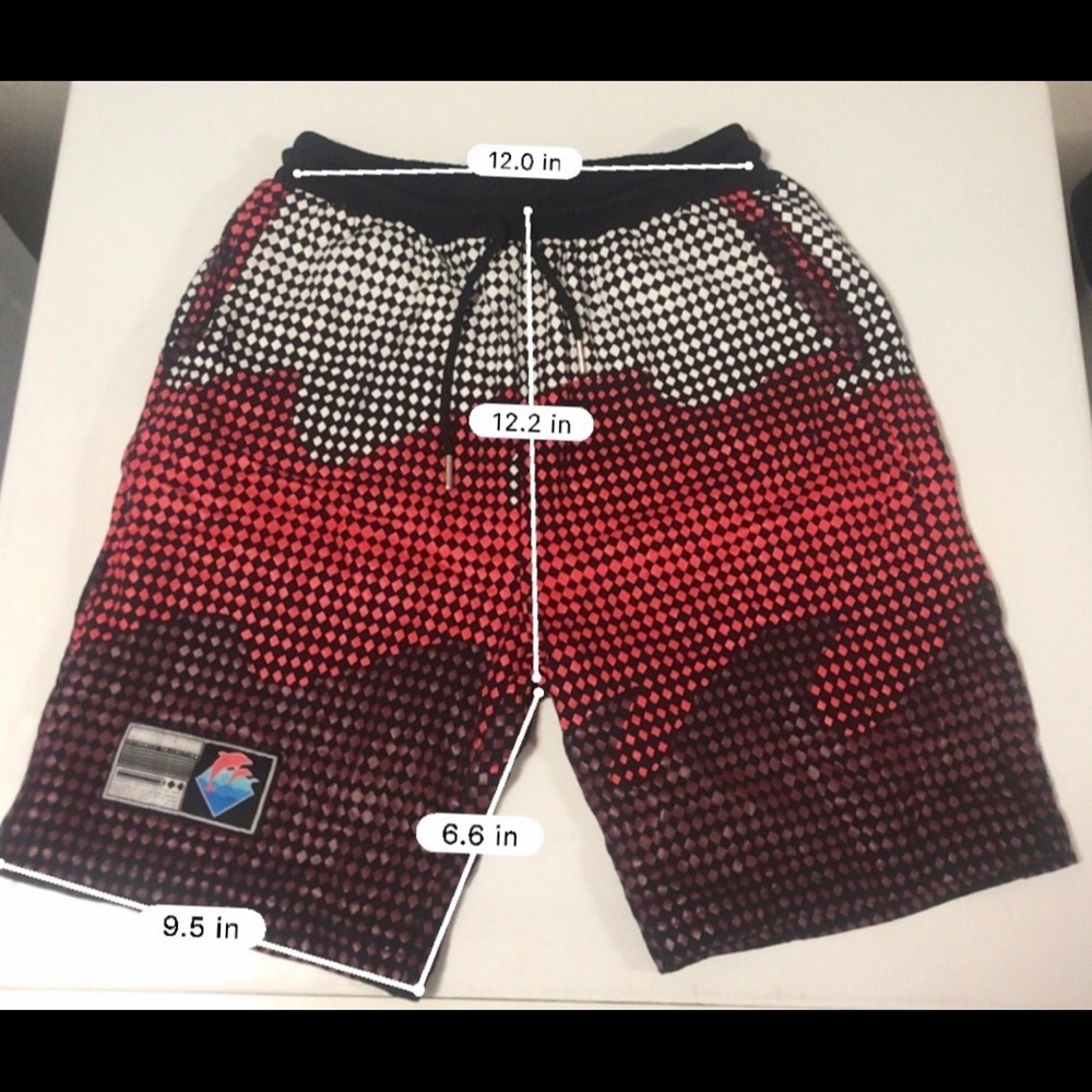 Pink Dolphin red wave shorts.